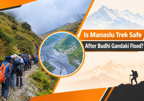 Trekkers on a Himalayan trail and a snow capped peak for Manaslu Trek safety after Budhi Gandaki flood